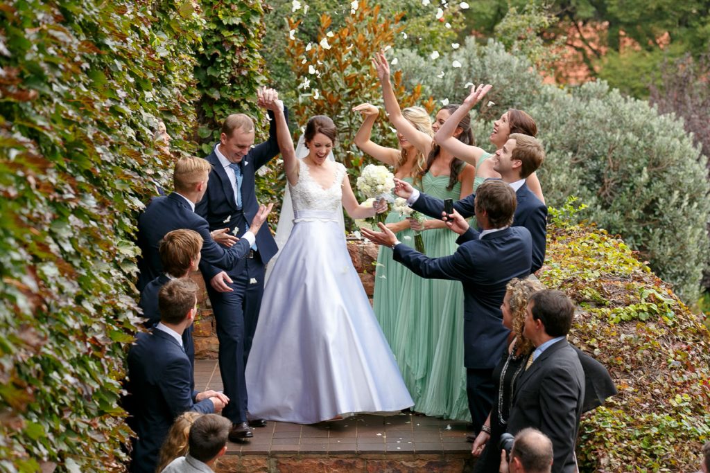Bride and groom celebrating at St George's Anglican Church in Parktown Johannesburg