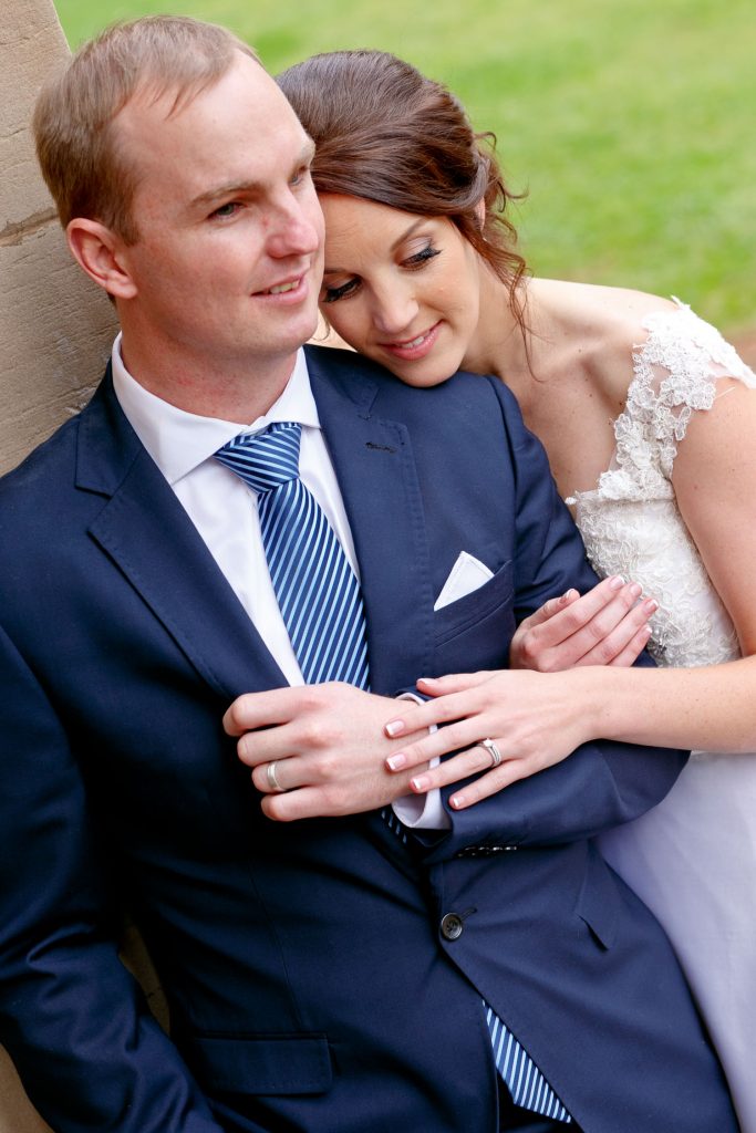 the bride holding the groom at Emoyeni wedding venue