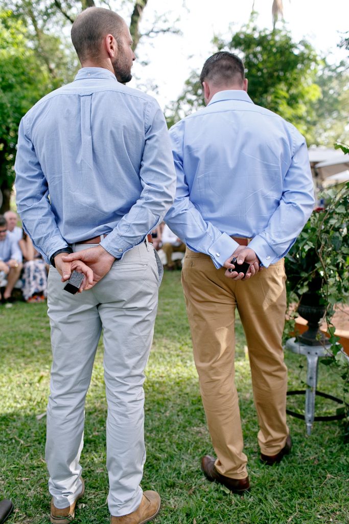 best men holding the wedding rings at at Zambezi House Victoria Falls Zimbabwe