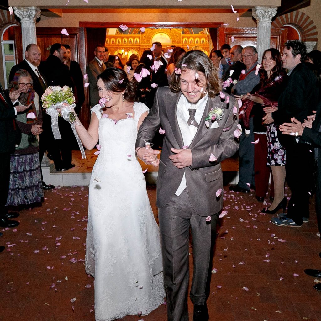 Wedding couple celebrating at Saheti Greek Church