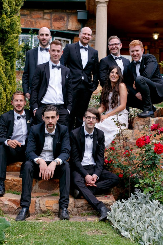 Jewish men and the bride posing for a group photo at Shepstone Gardens