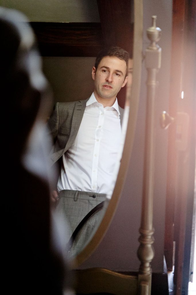 Jewish groom getting dressed at Shepstone Gardens