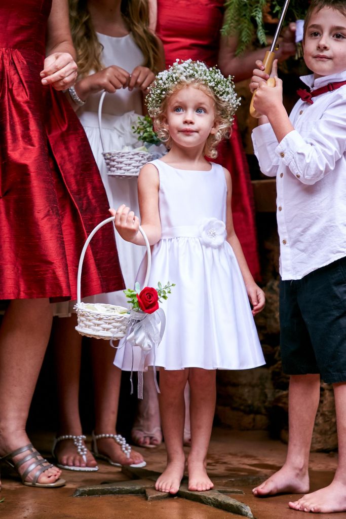bridesmaids in red dresses at Shepstone Gardens Johannesburg