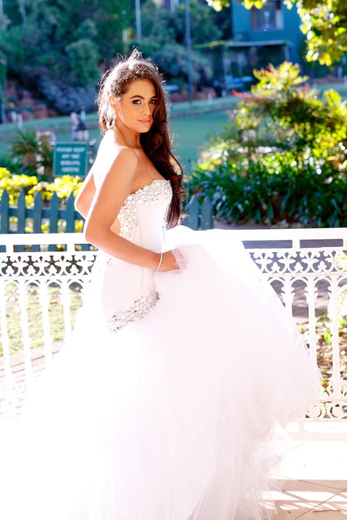 Bride in her sparkling white wedding gown at The Wanderers Hotel in Johannesburg
