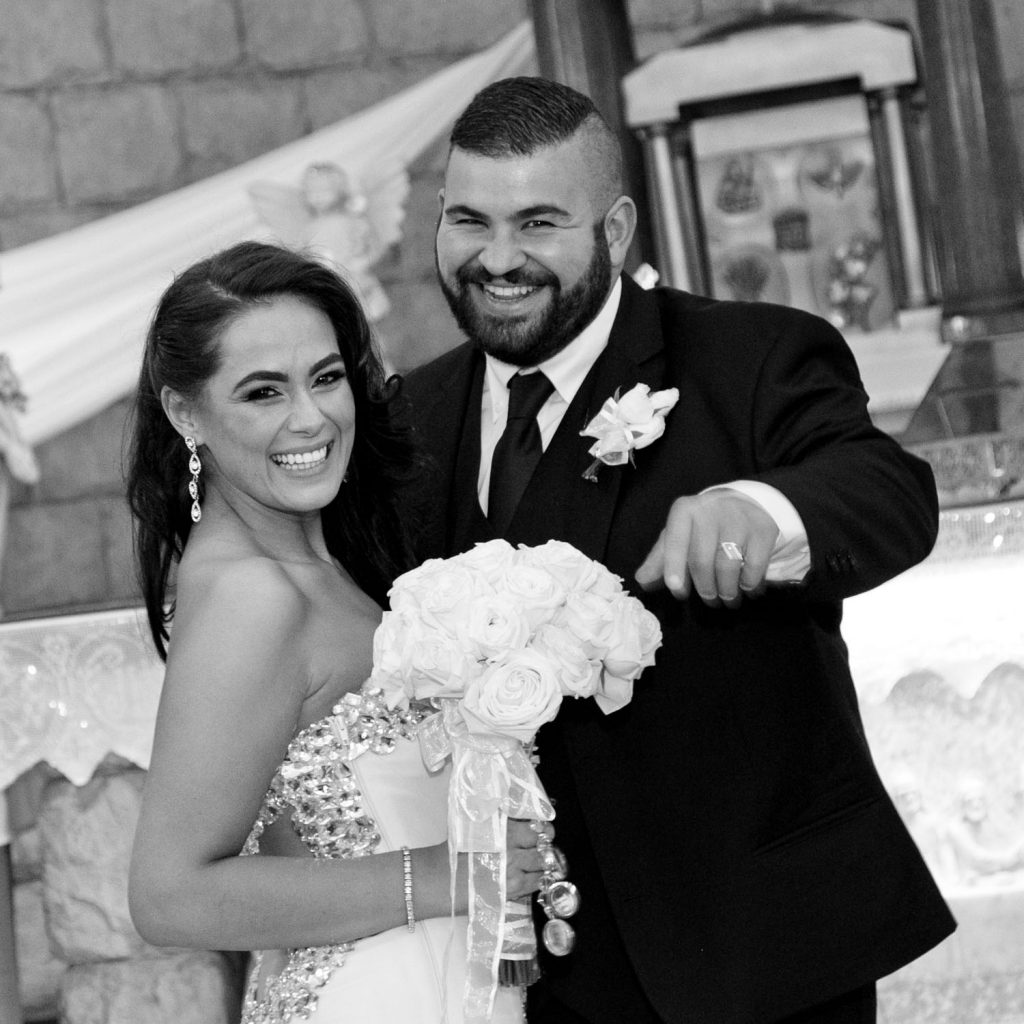 Black and white wedding images at Our Lady of Cedars in Woodmead